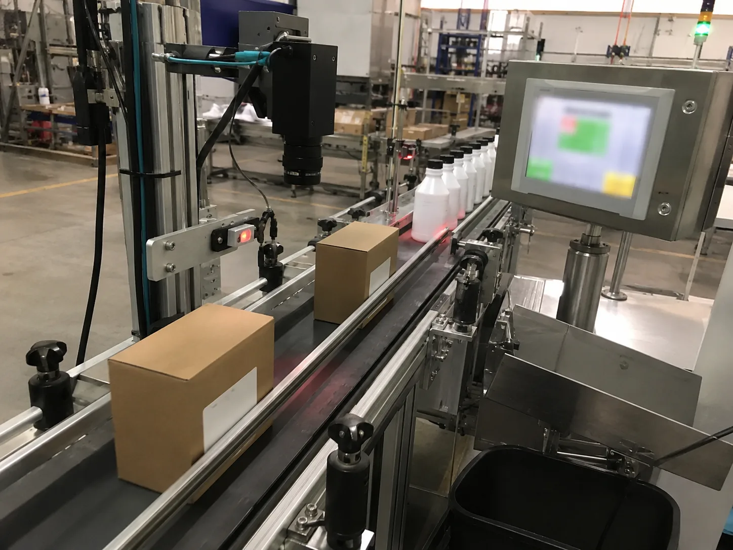 Packaging label and barcode traceability inspection on conveyor line
