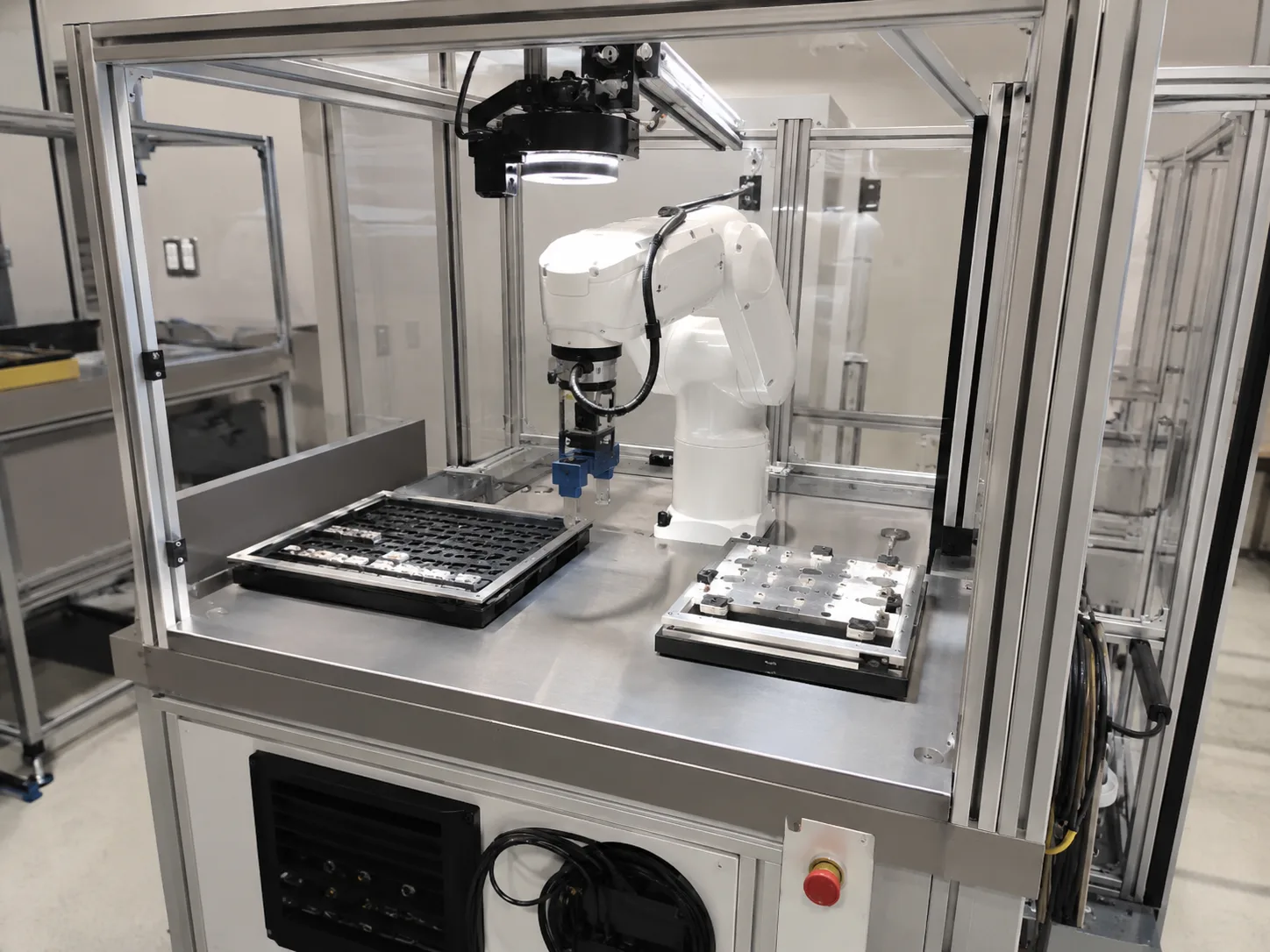 Robot guidance pick and place positioning cell with camera and ring lighting